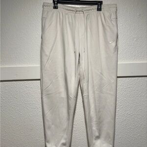 Nike Dri FIT UV Primary Jogger Sweatpants Pale Ivory Sz L Mens FZ0975 110